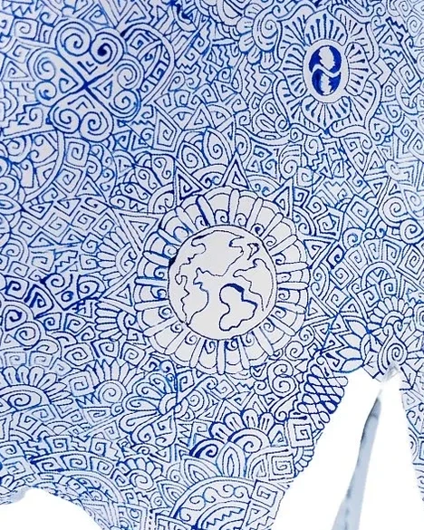 A circular illustrated motif amid fine blue linework on white