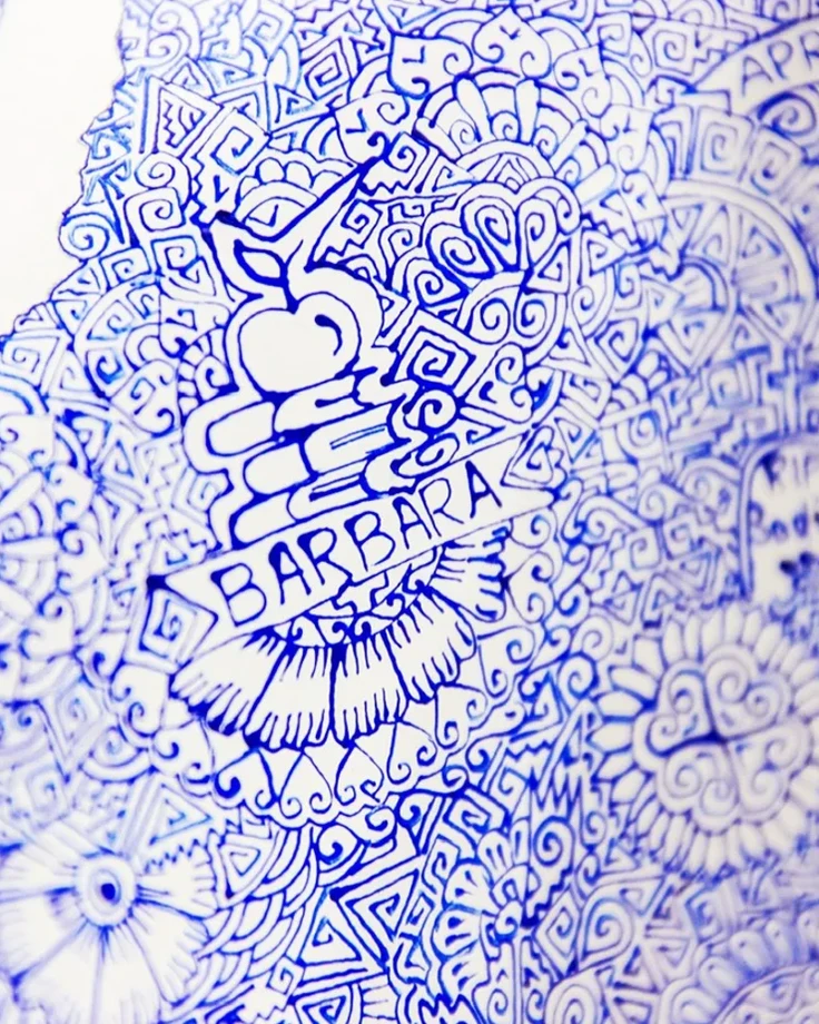 Personal lettering and illustrated details in a blue and white commission